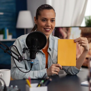 Team defining project requirements around a laptop